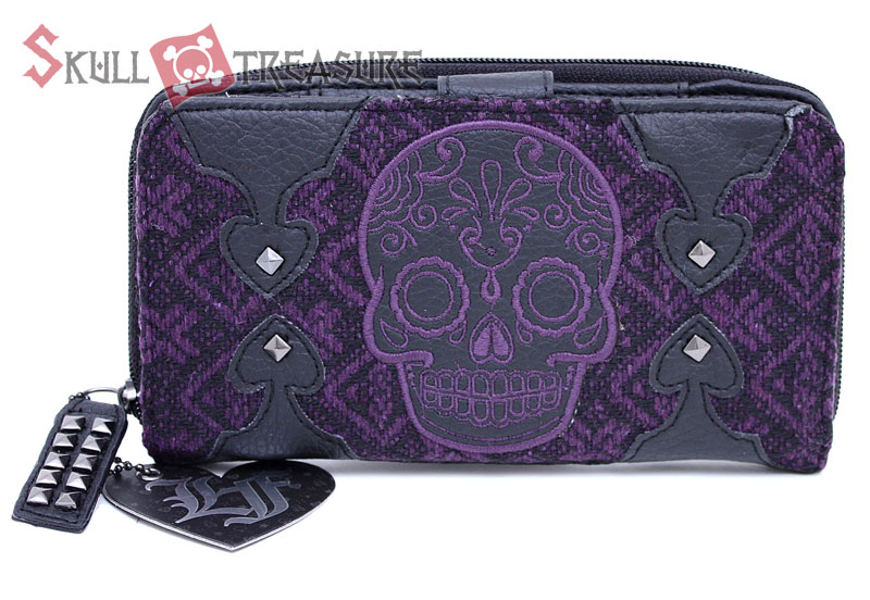 Loungefly Sugar Skull Wallet. Allover skull and roses pattern. Loungefly badge  on front. Zip around enclosure. Interior offers 2 pockets, zip close pocket.